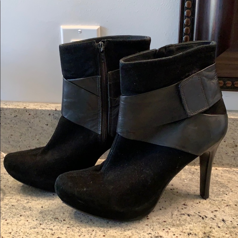 Woman’s black suede bootie